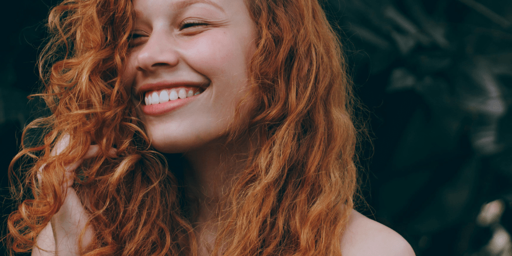 Textured hair with natural waves.